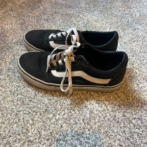 Black low top Vans shoes